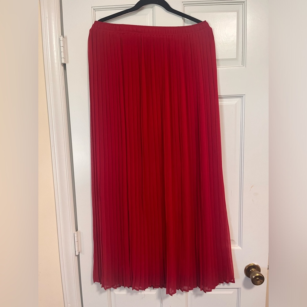 Red pleated skirt